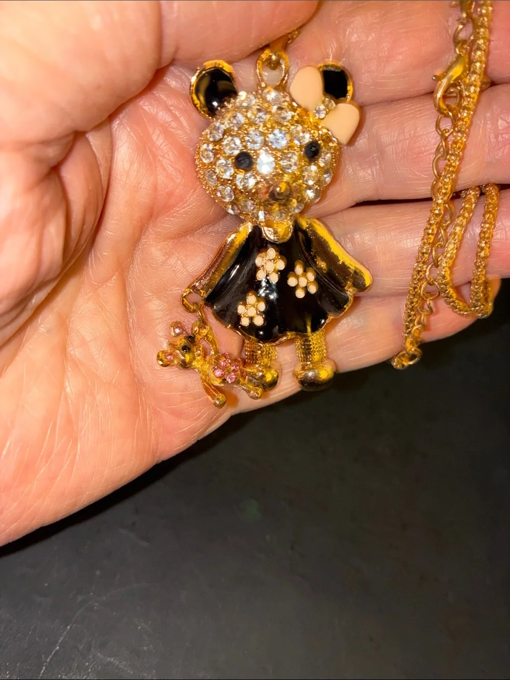 Crystal Bear Holding Her Teddy Bear. Wearing A Black Enamel Dress. Blinged Out.